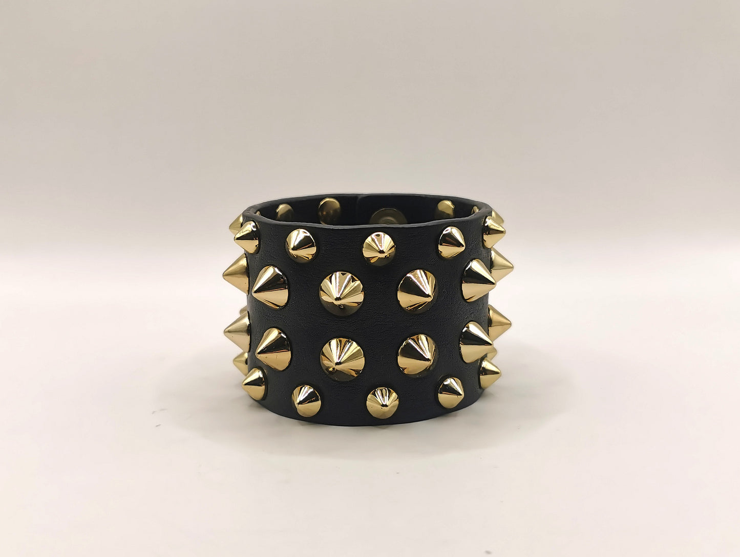 Balmain studded leather cuff bracelet, black and gold