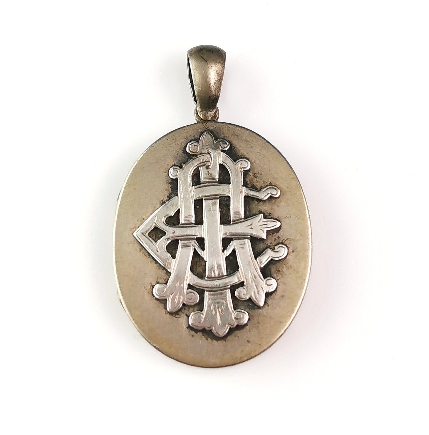 Antique Victorian AEI locket pendant, Silver plated