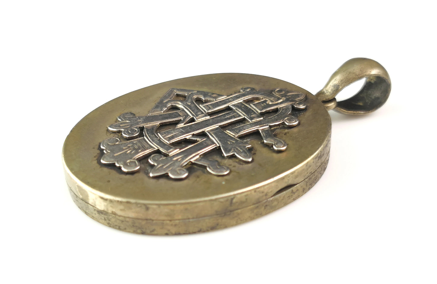 Antique Victorian AEI locket pendant, Silver plated