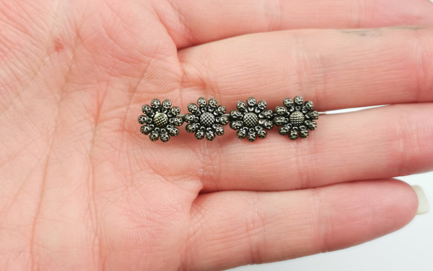 Antique cut steel flower brooch, Victorian