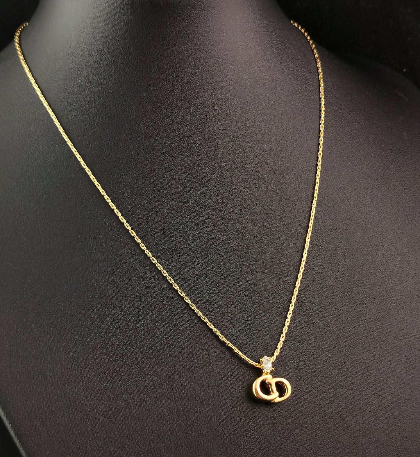 Vintage Christian Dior logo pendant necklace, gold tone and paste