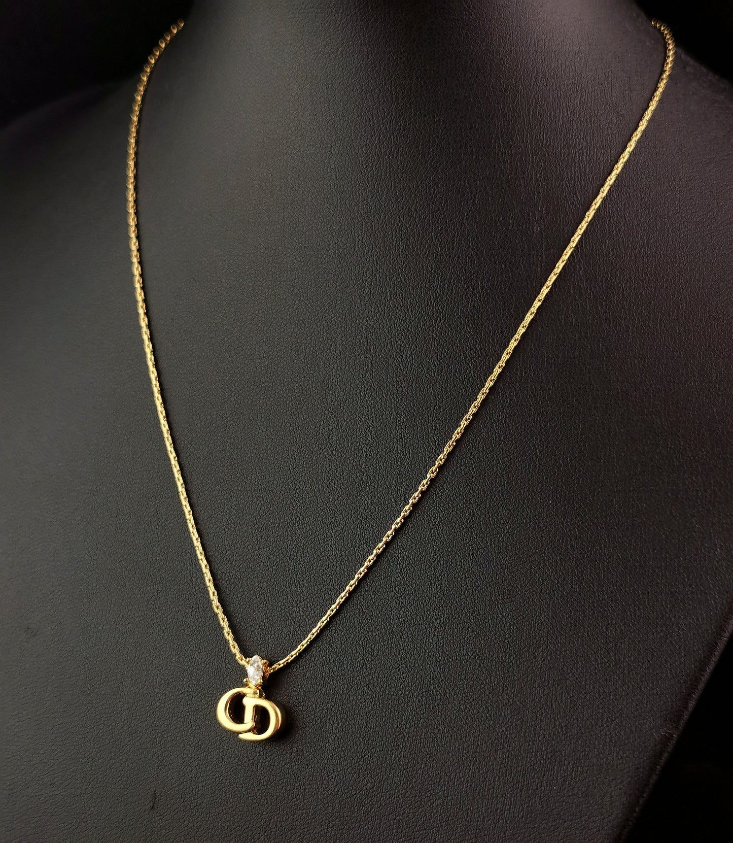 Vintage Christian Dior logo pendant necklace, gold tone and paste