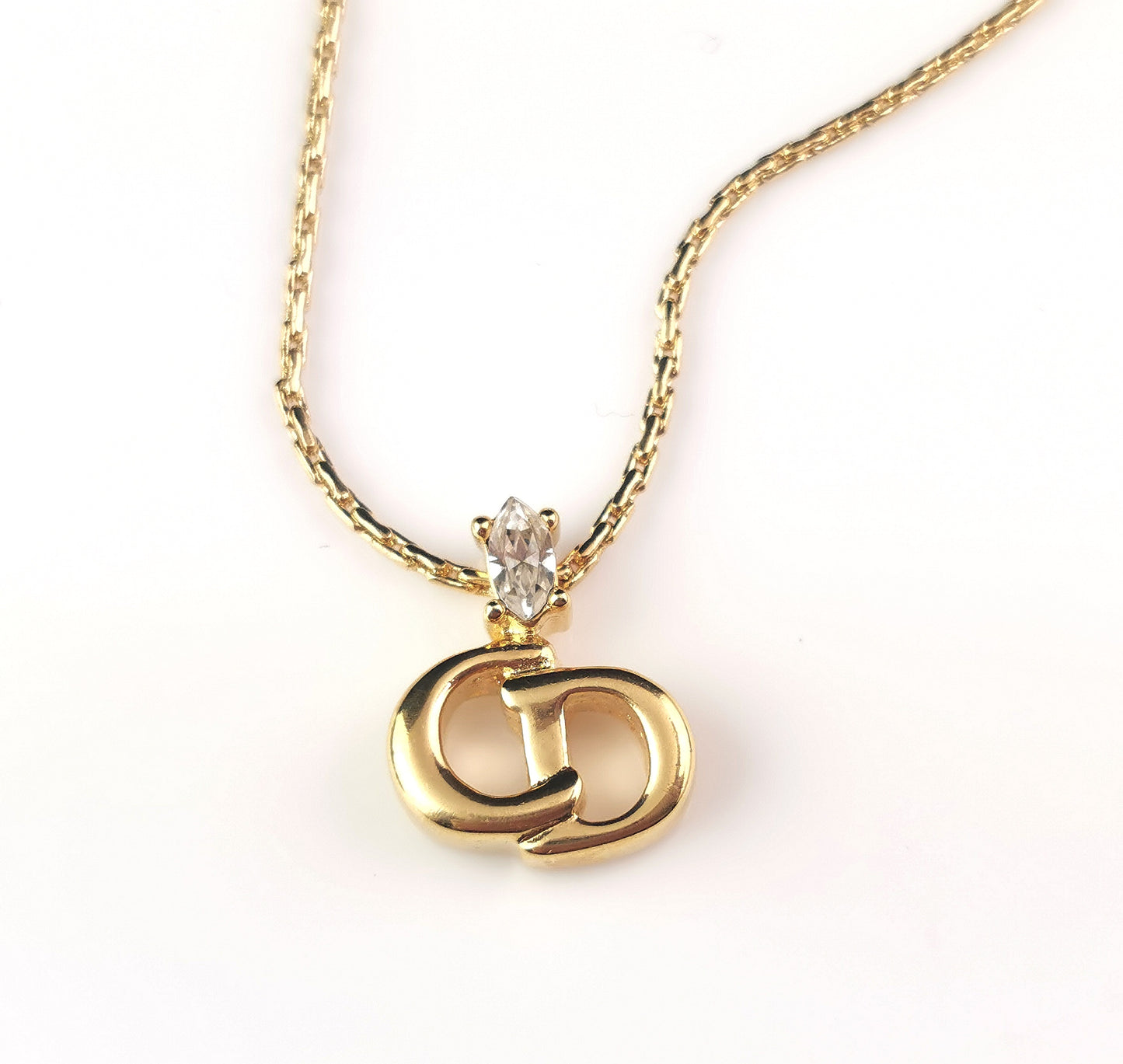 Vintage Christian Dior logo pendant necklace, gold tone and paste