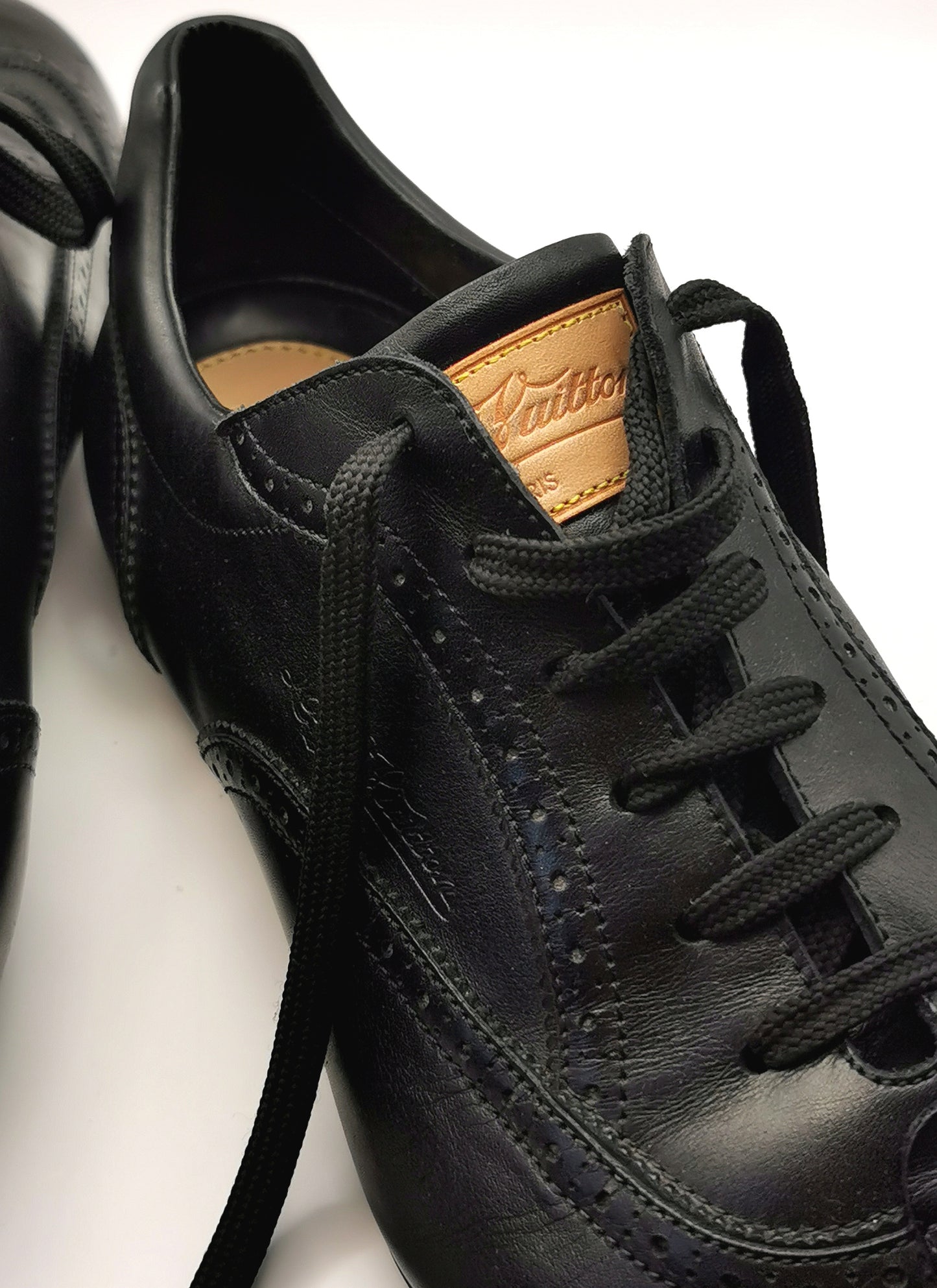 Louis Vuitton black leather lace up brogue style sneakers