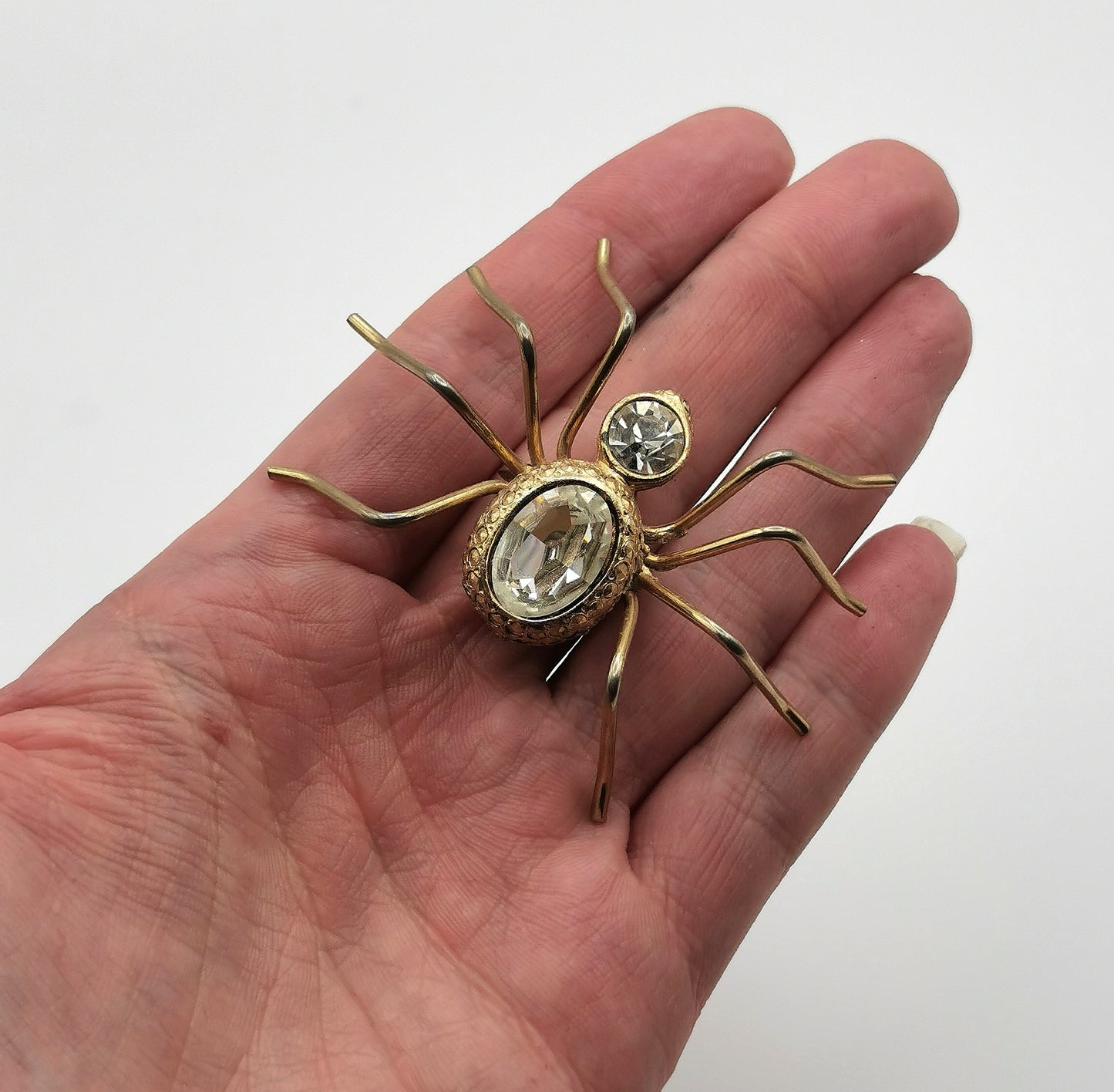 Vintage large spider brooch, gold tone, clear paste
