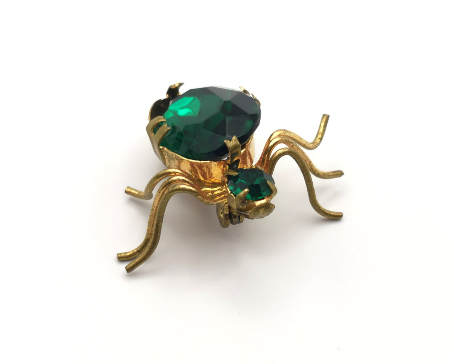 Antique gilt metal spider brooch, Emerald green paste