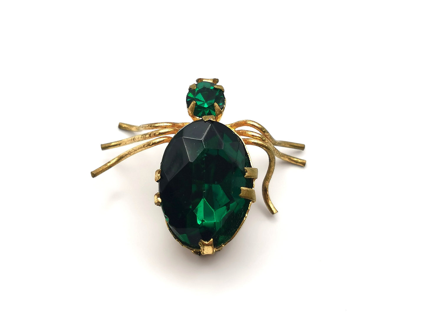 Antique gilt metal spider brooch, Emerald green paste
