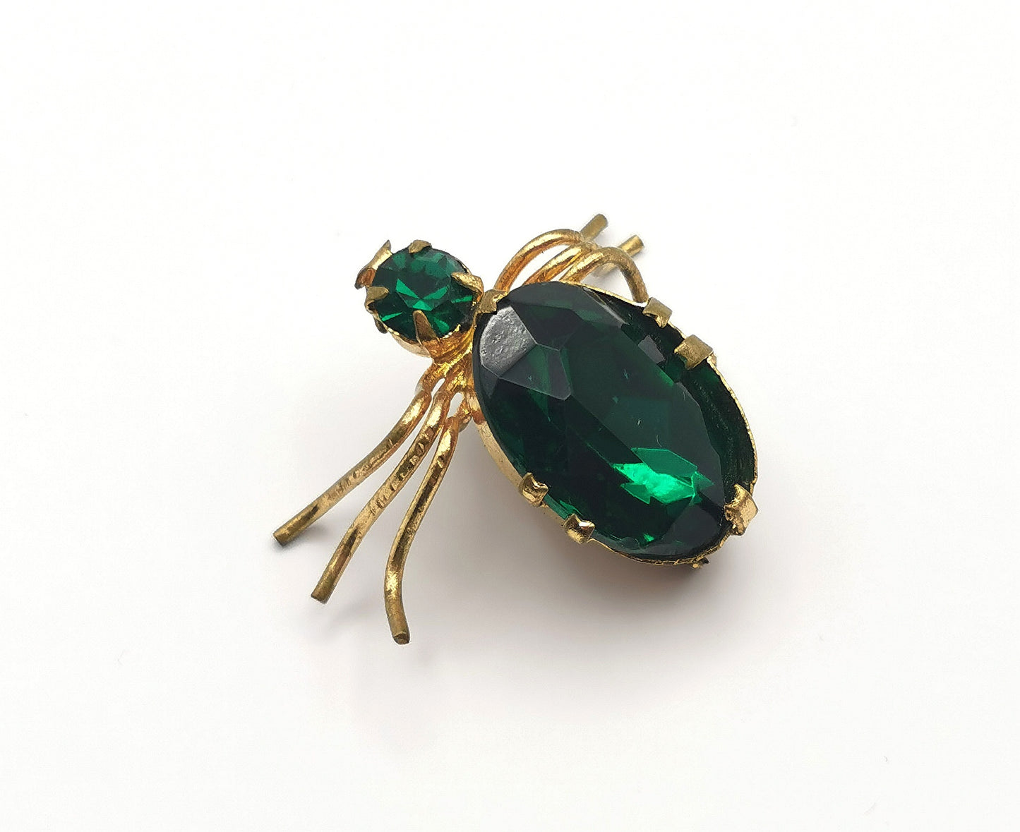 Antique gilt metal spider brooch, Emerald green paste