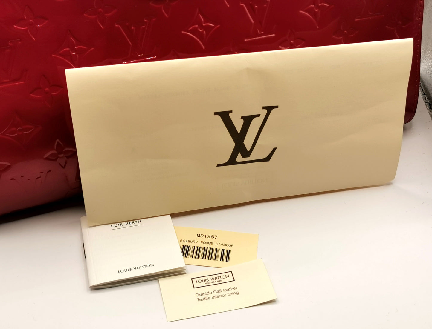 Louis Vuitton Roxbury Drive handbag, Pomme D'amour, Red Vernis leather