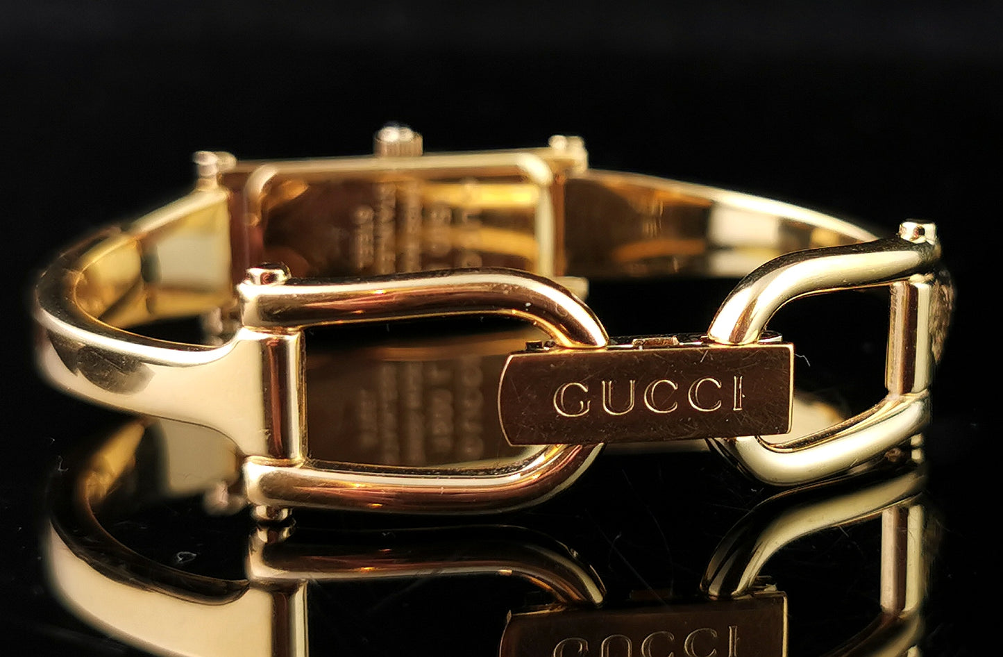 Vintage Gucci 1500l gold plated ladies wristwatch, Horsebit bangle strap