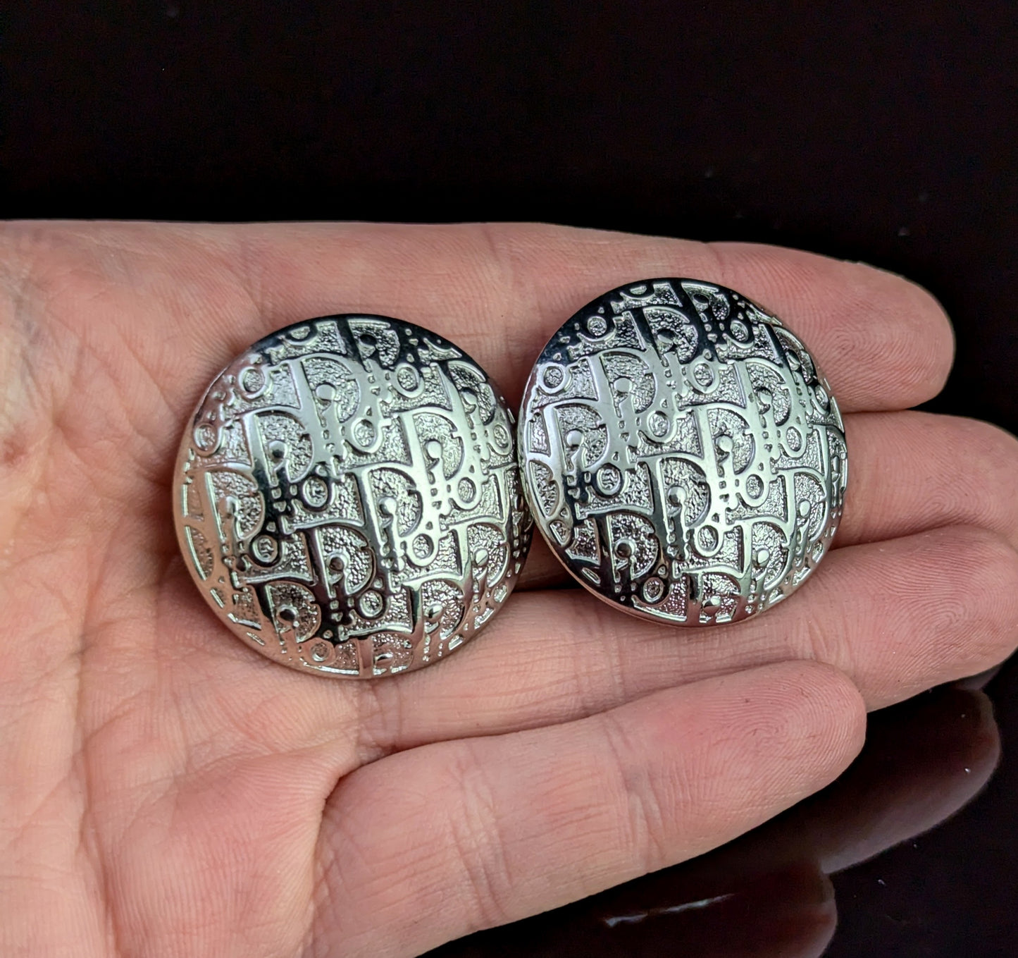 Vintage Christian Dior clip on earrings, logo script, silver tone