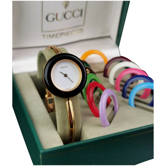 Vintage Gucci 11/12.2 ladies gold plated wristwatch, bracelet strap, changeable bezels