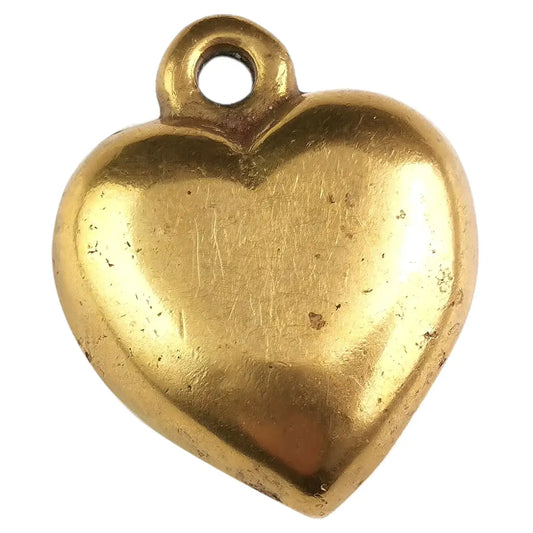 Antique Victorian brass puffy heart pendant