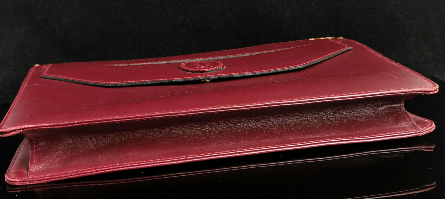 Cartier, Must De Cartier oxblood leather clutch purse, bag