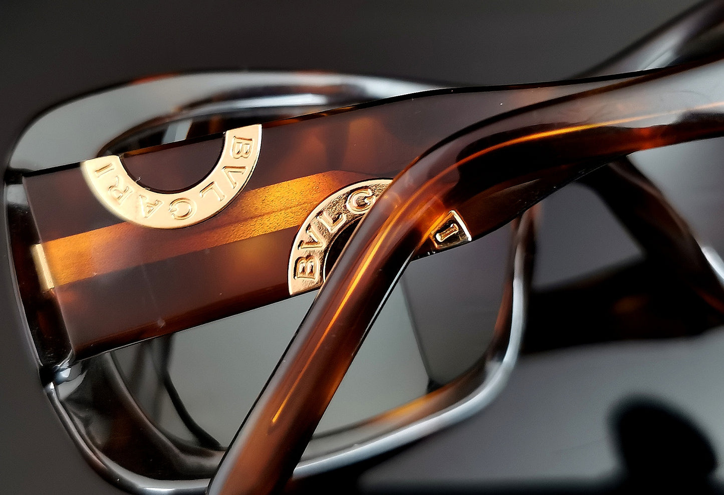 Bvlgari faux tortoiseshell sunglasses, gold tone logo