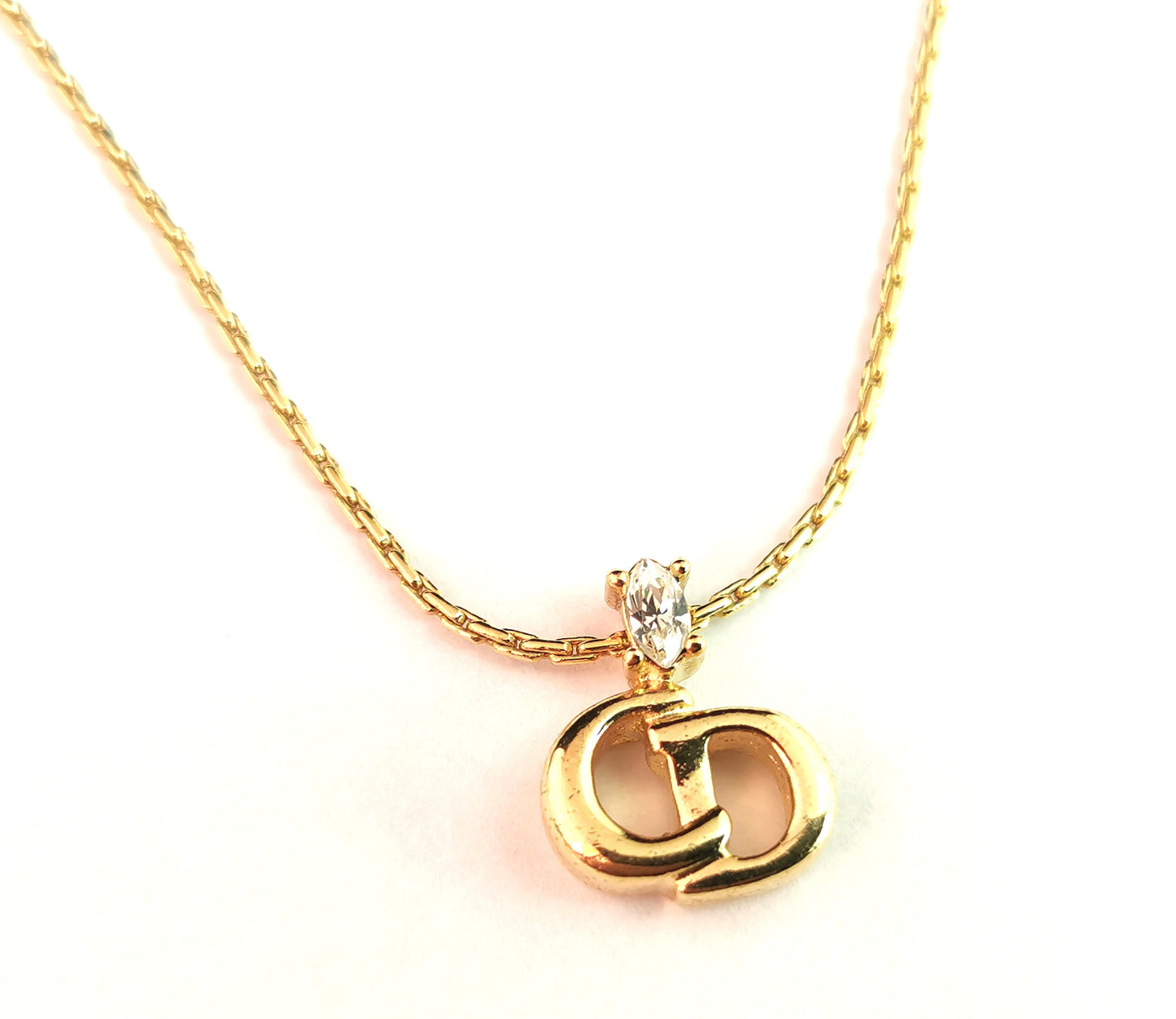 Vintage Christian Dior logo pendant necklace, gold tone and paste