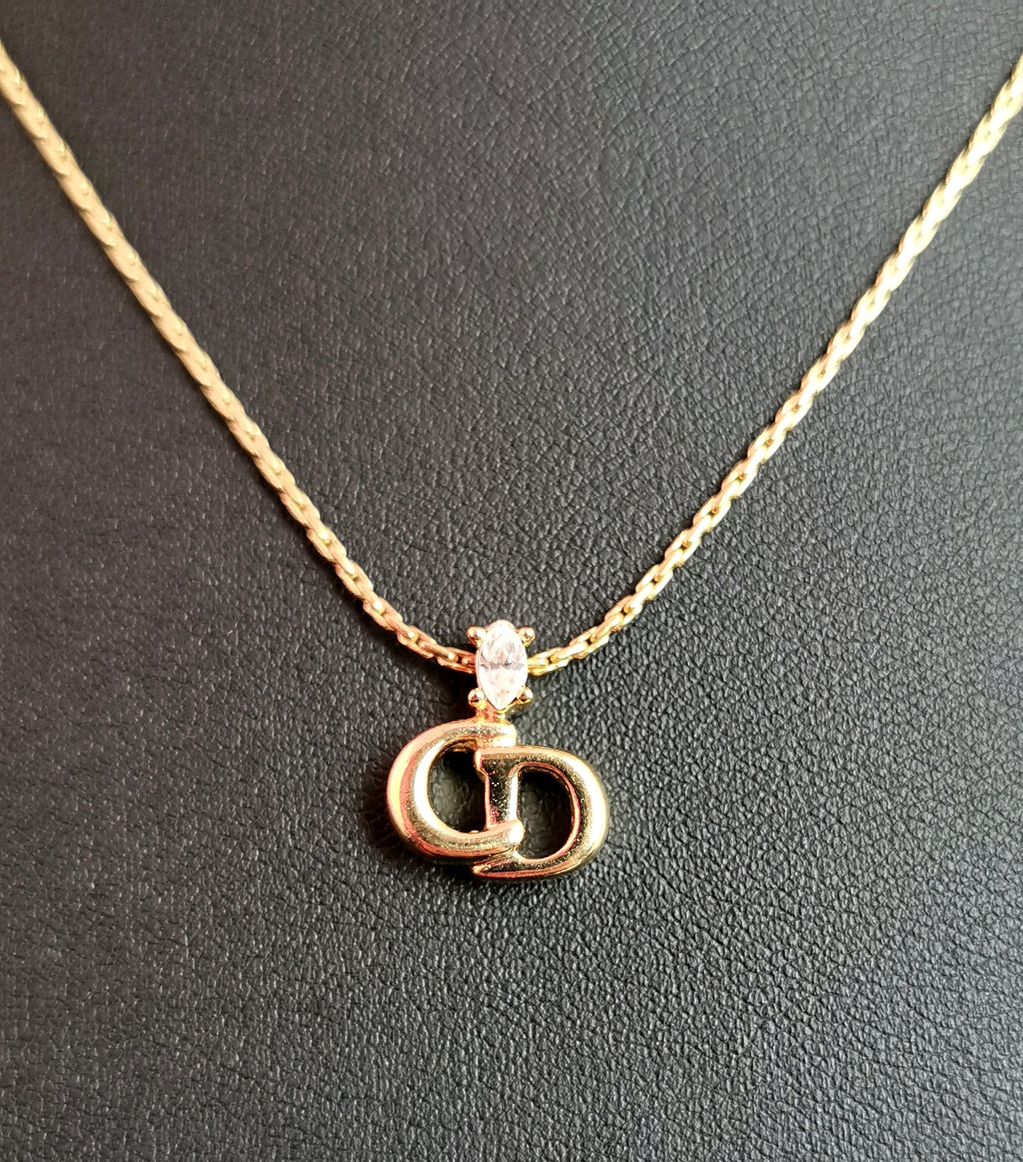 Vintage Christian Dior logo pendant necklace, gold tone and paste