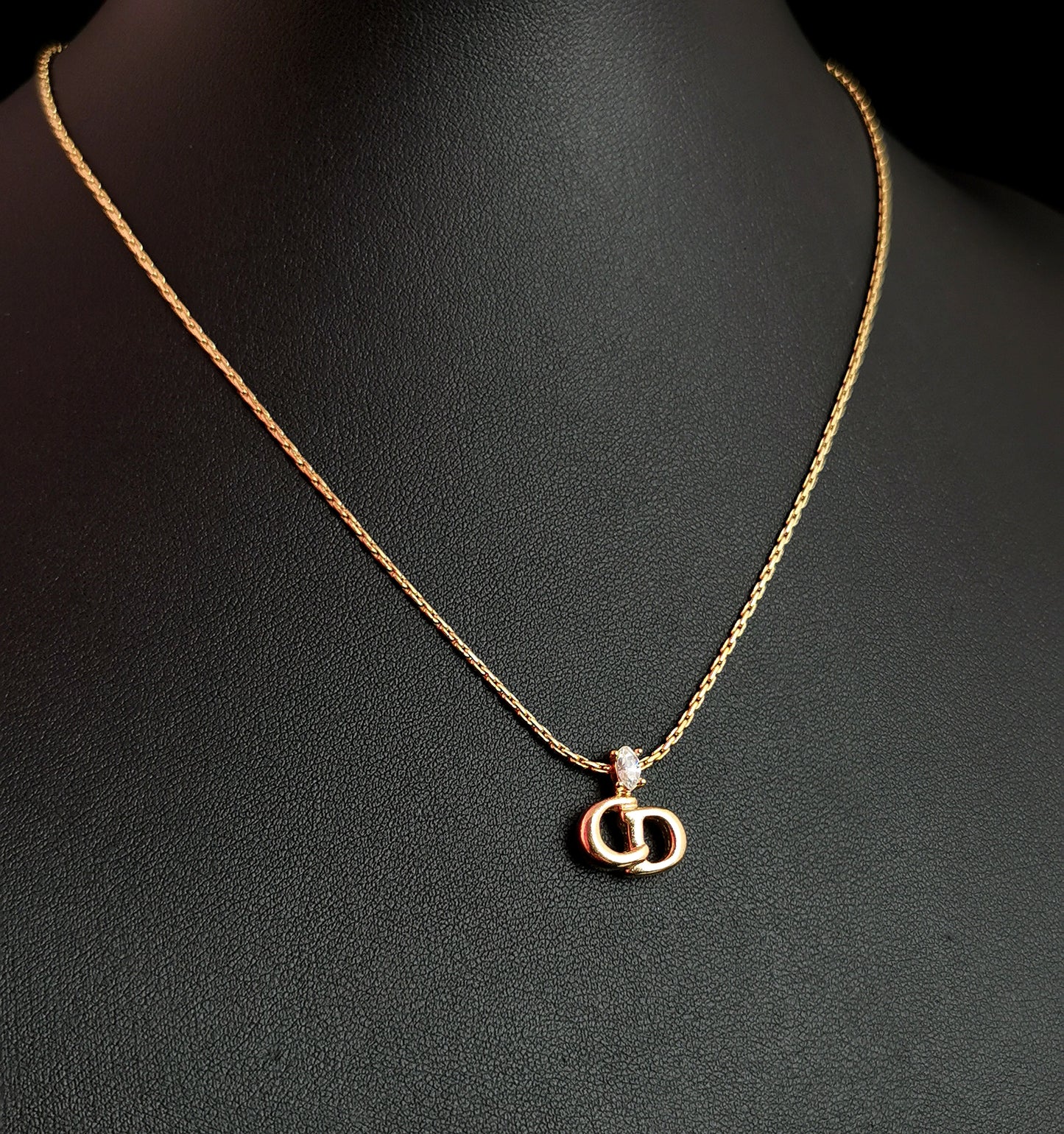 Vintage Christian Dior logo pendant necklace, gold tone and paste