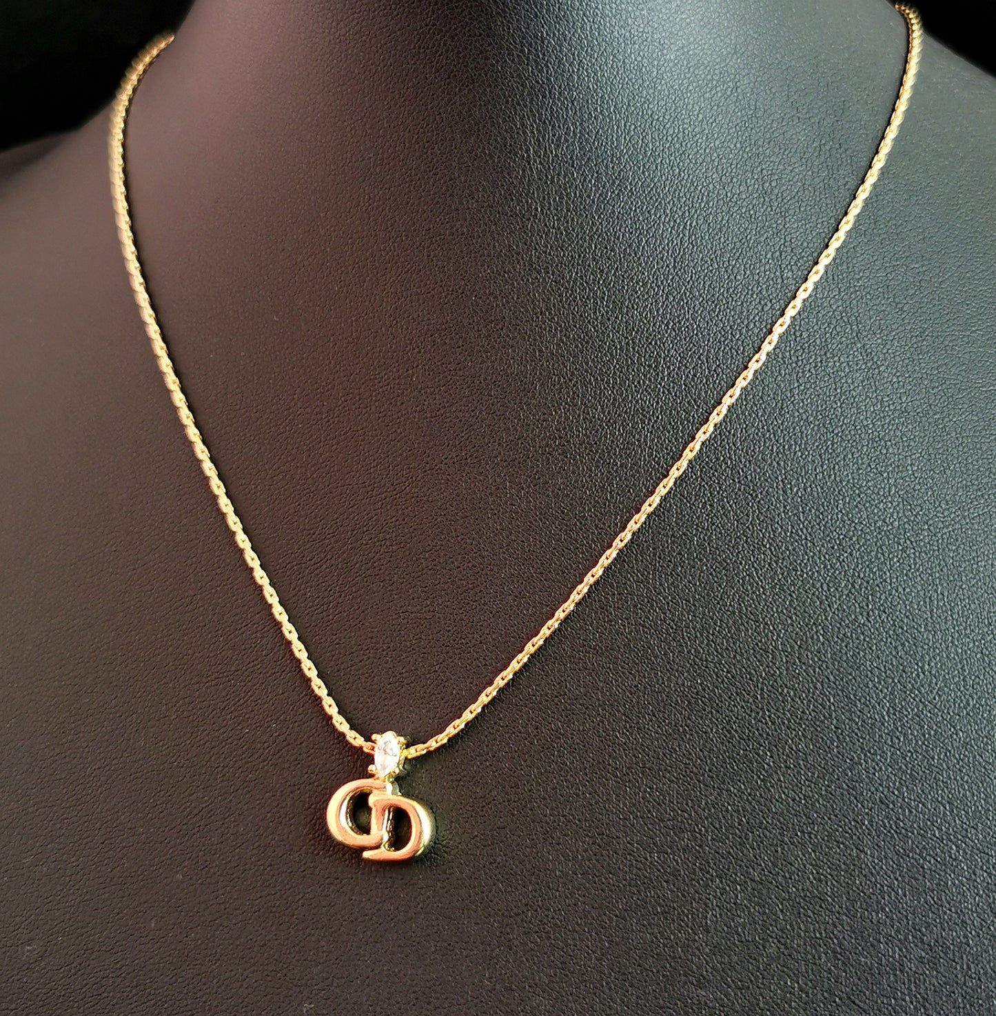 Vintage Christian Dior logo pendant necklace, gold tone and paste
