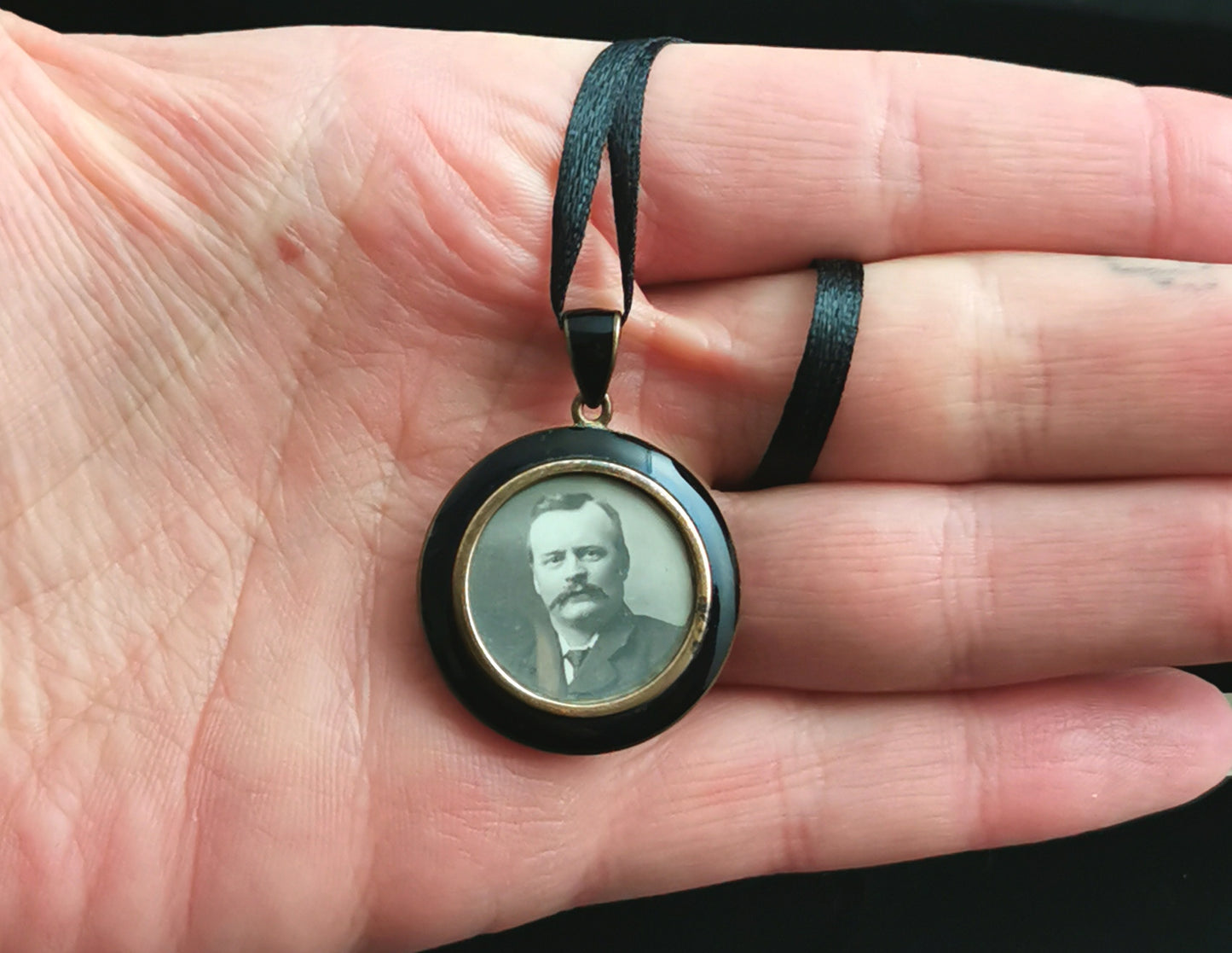 Antique mourning locket, enamel and brass, Edwardian