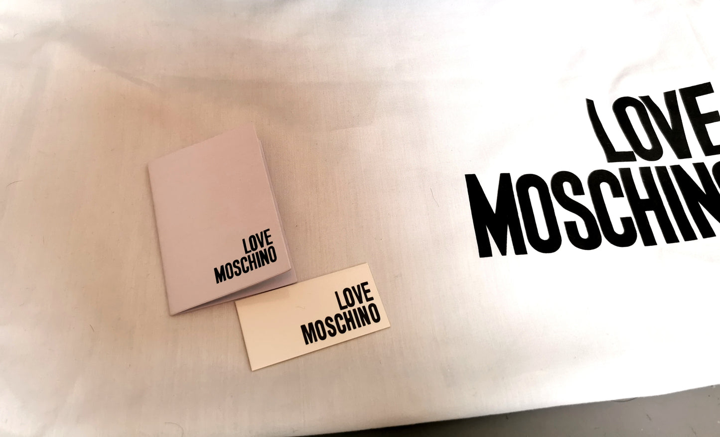 Moschino Love chain handle backpack, Black and Red