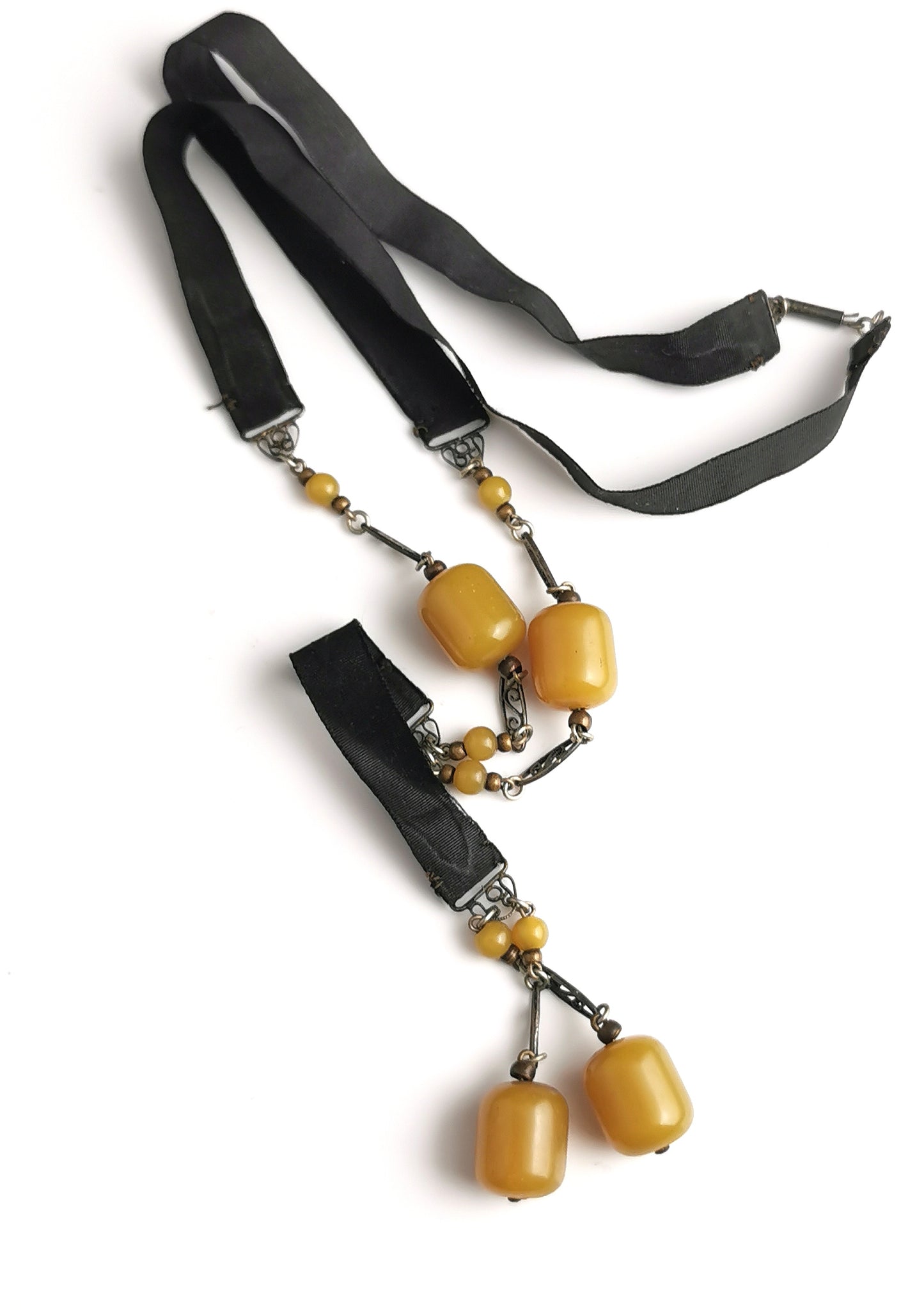 Antique Art Deco Sautoir necklace, black silk and butterscotch bead