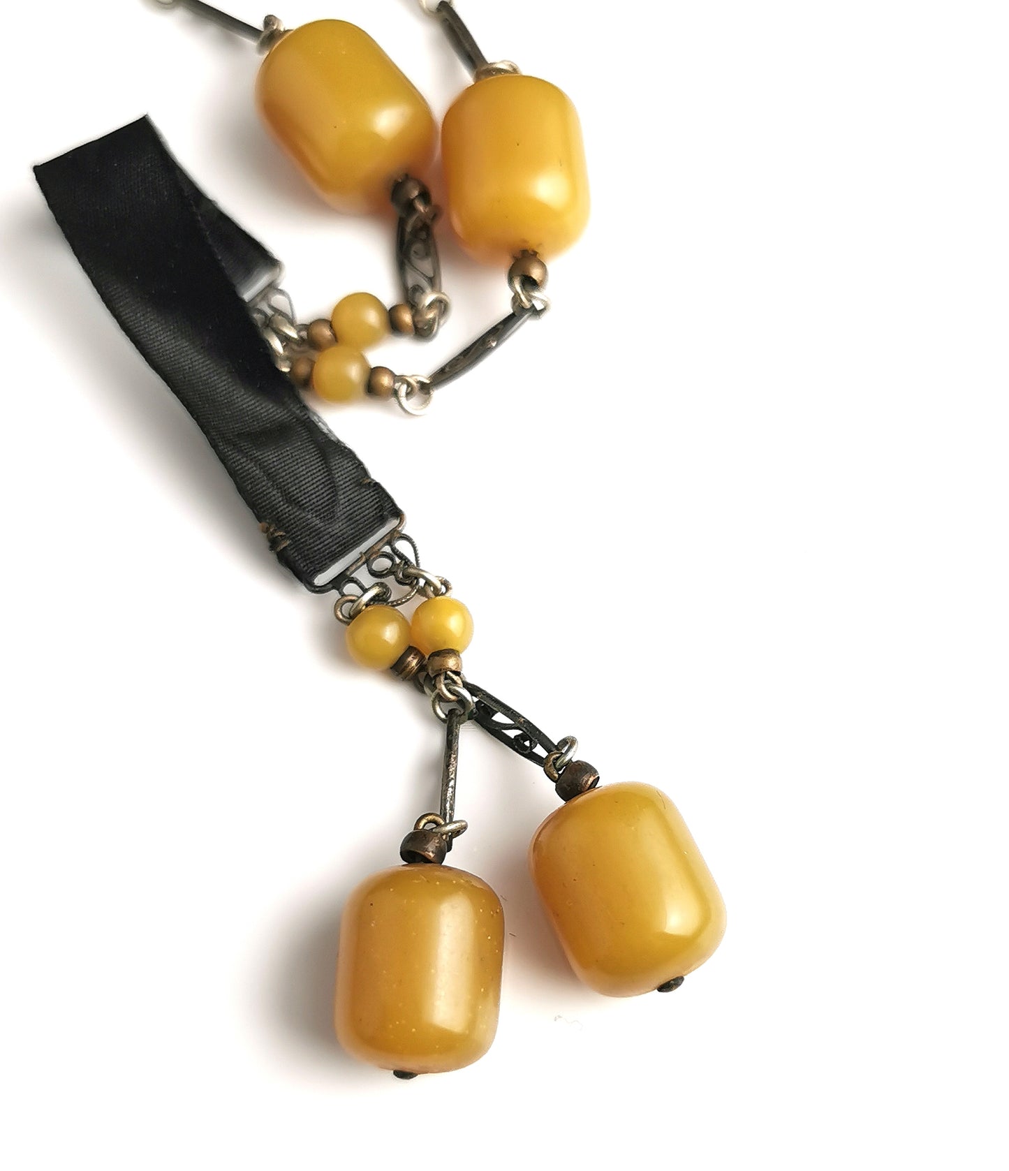 Antique Art Deco Sautoir necklace, black silk and butterscotch bead