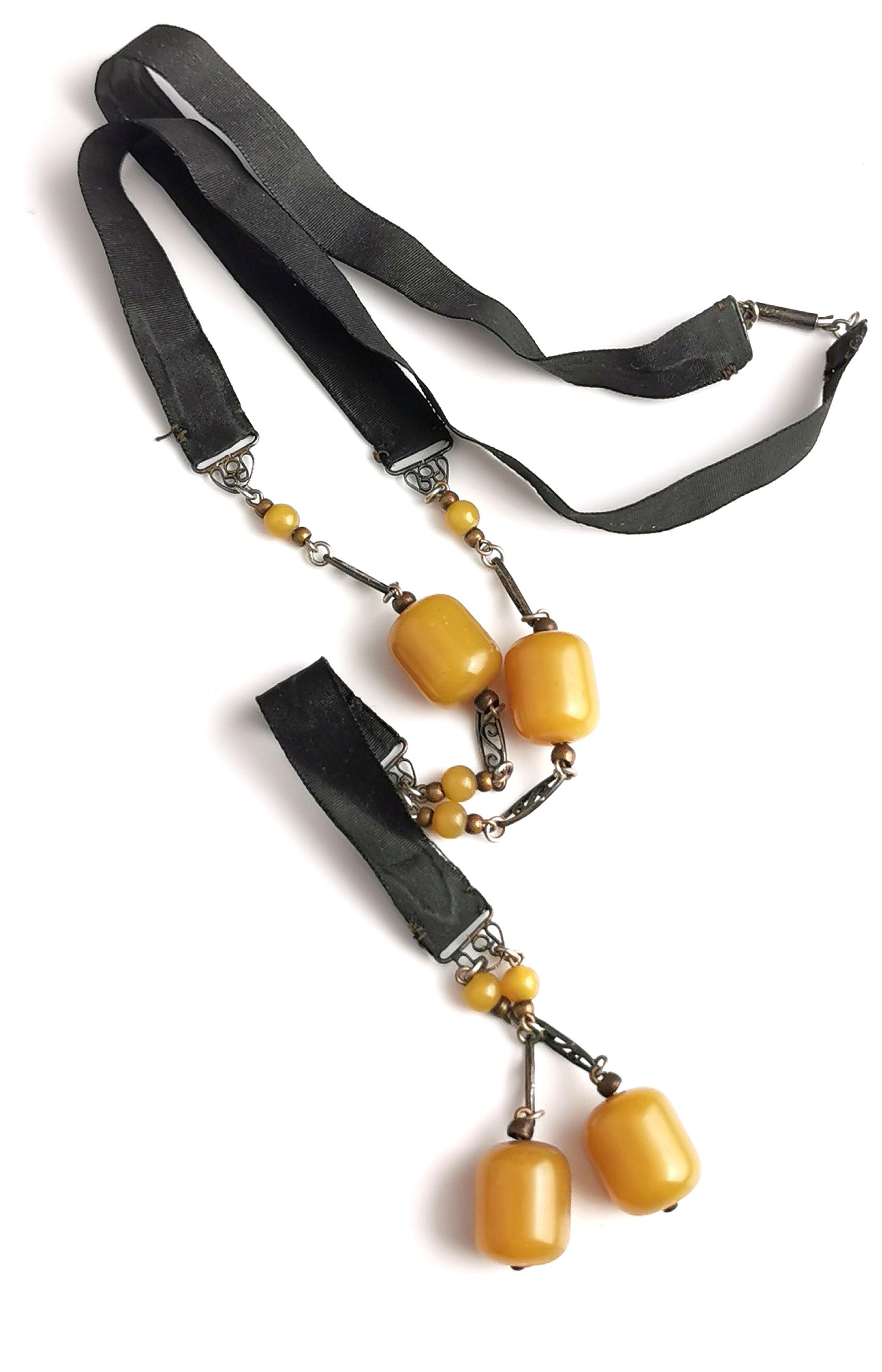Antique Art Deco Sautoir necklace, black silk and butterscotch bead