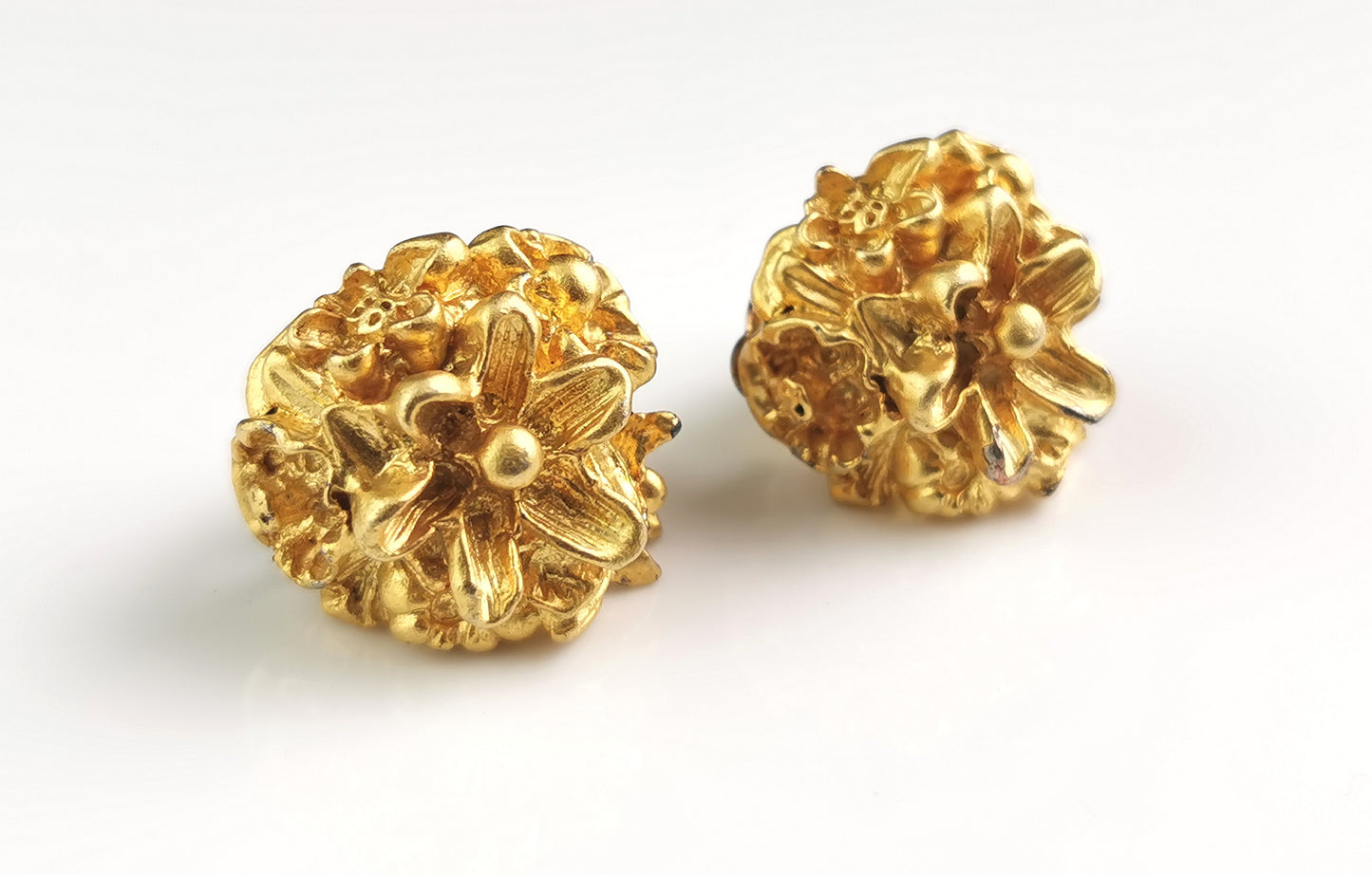 Vintage Gold tone floral clip on earrings, chunky