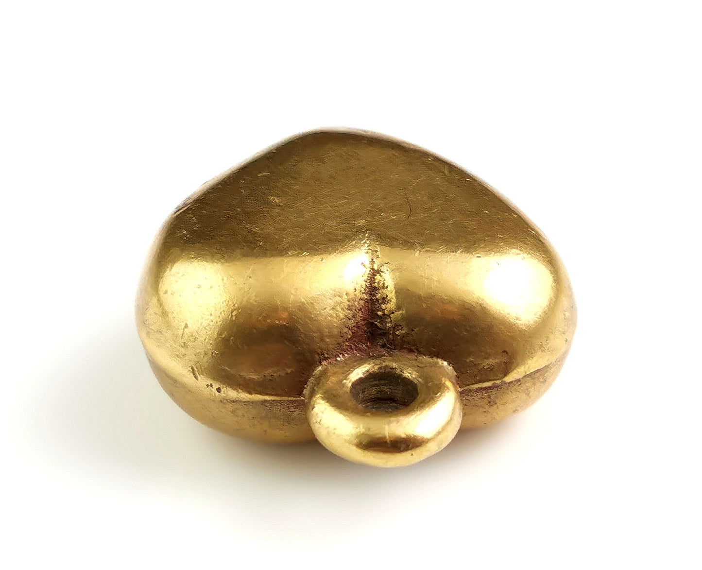 Antique Victorian brass puffy heart pendant