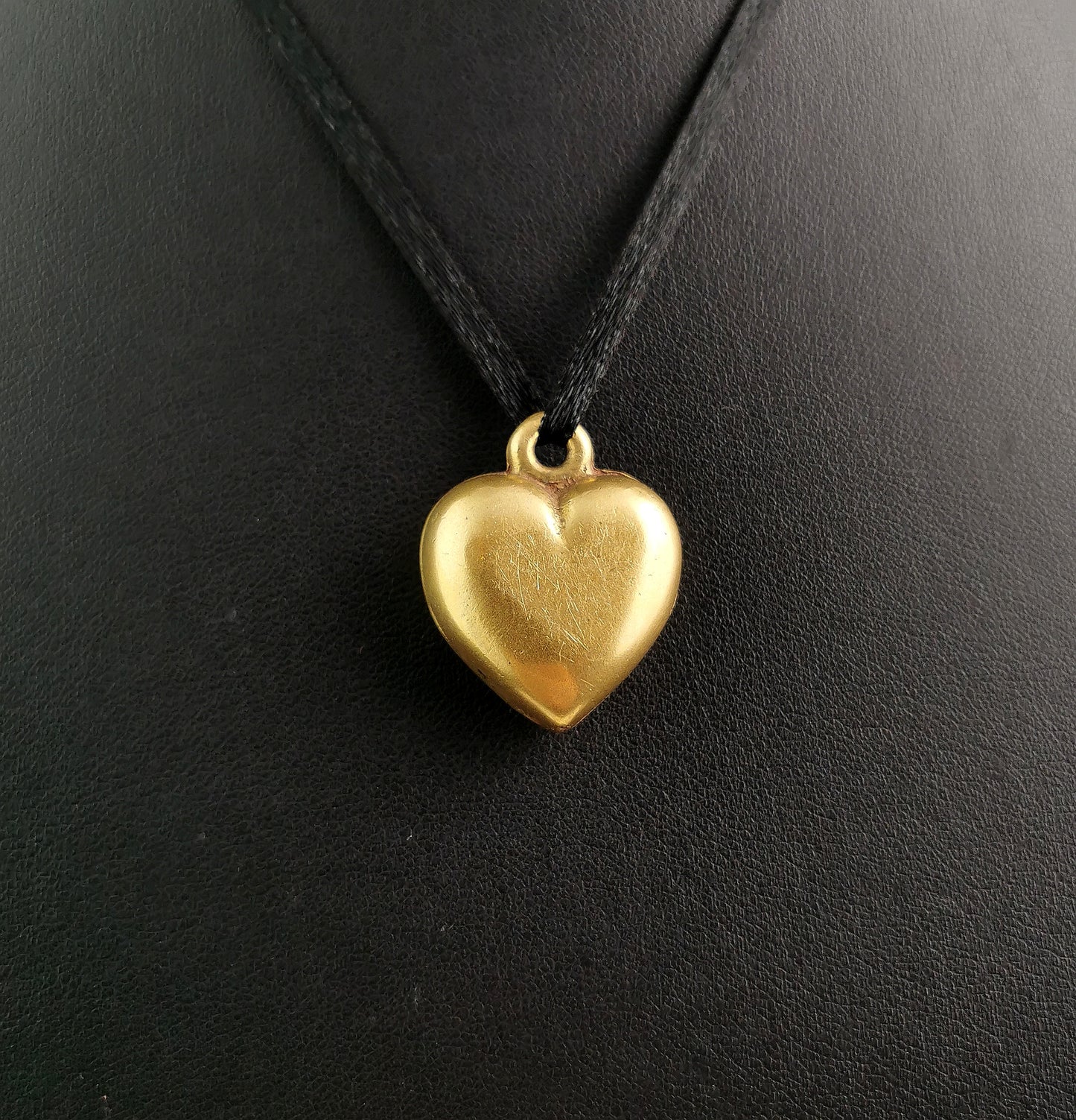 Antique Victorian brass puffy heart pendant