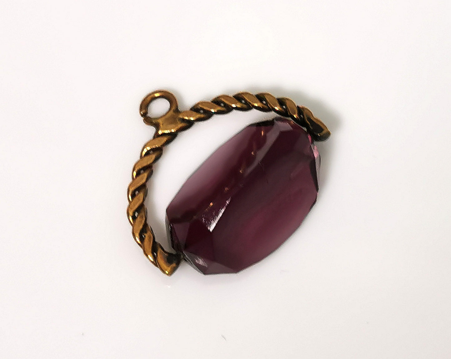 Antique spinning fob, gold plated, Purple glass