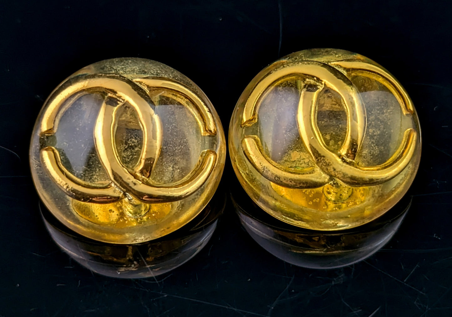 Vintage Chanel CC logo clip on earrings, Yellow and Gold tone