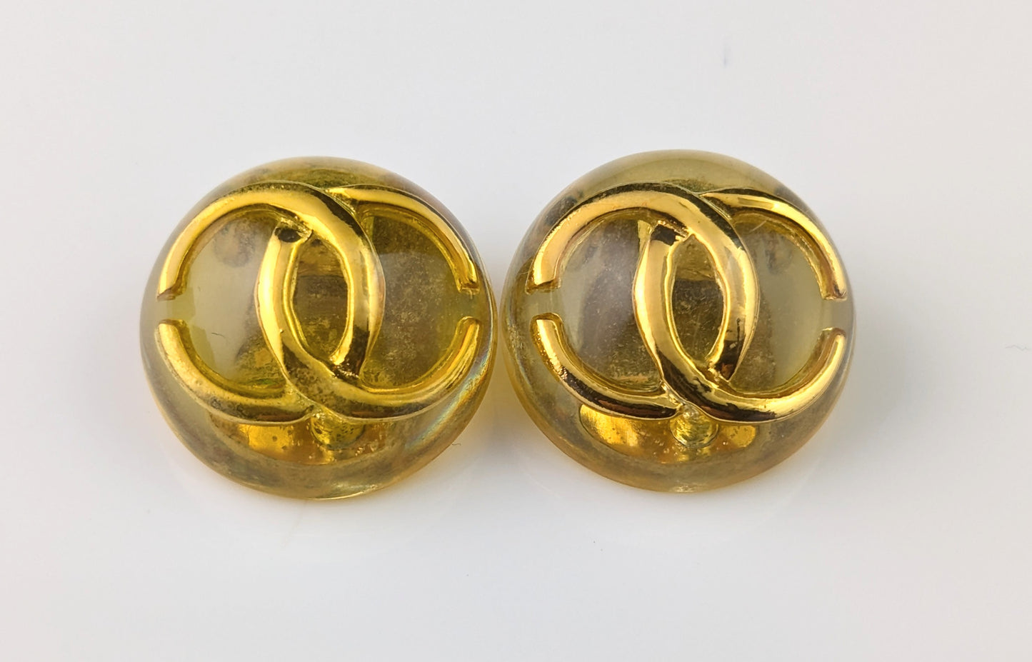 Vintage Chanel CC logo clip on earrings, Yellow and Gold tone