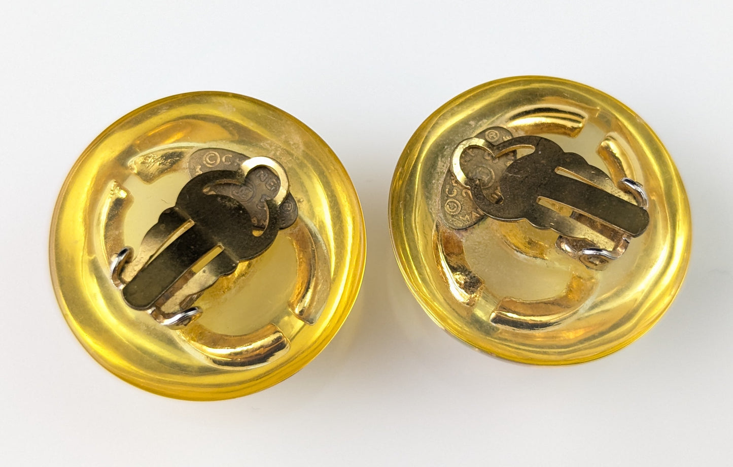 Vintage Chanel CC logo clip on earrings, Yellow and Gold tone