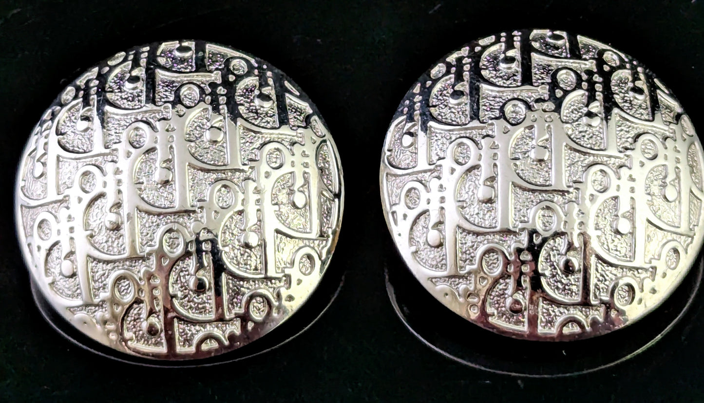 Vintage Christian Dior clip on earrings, logo script, silver tone