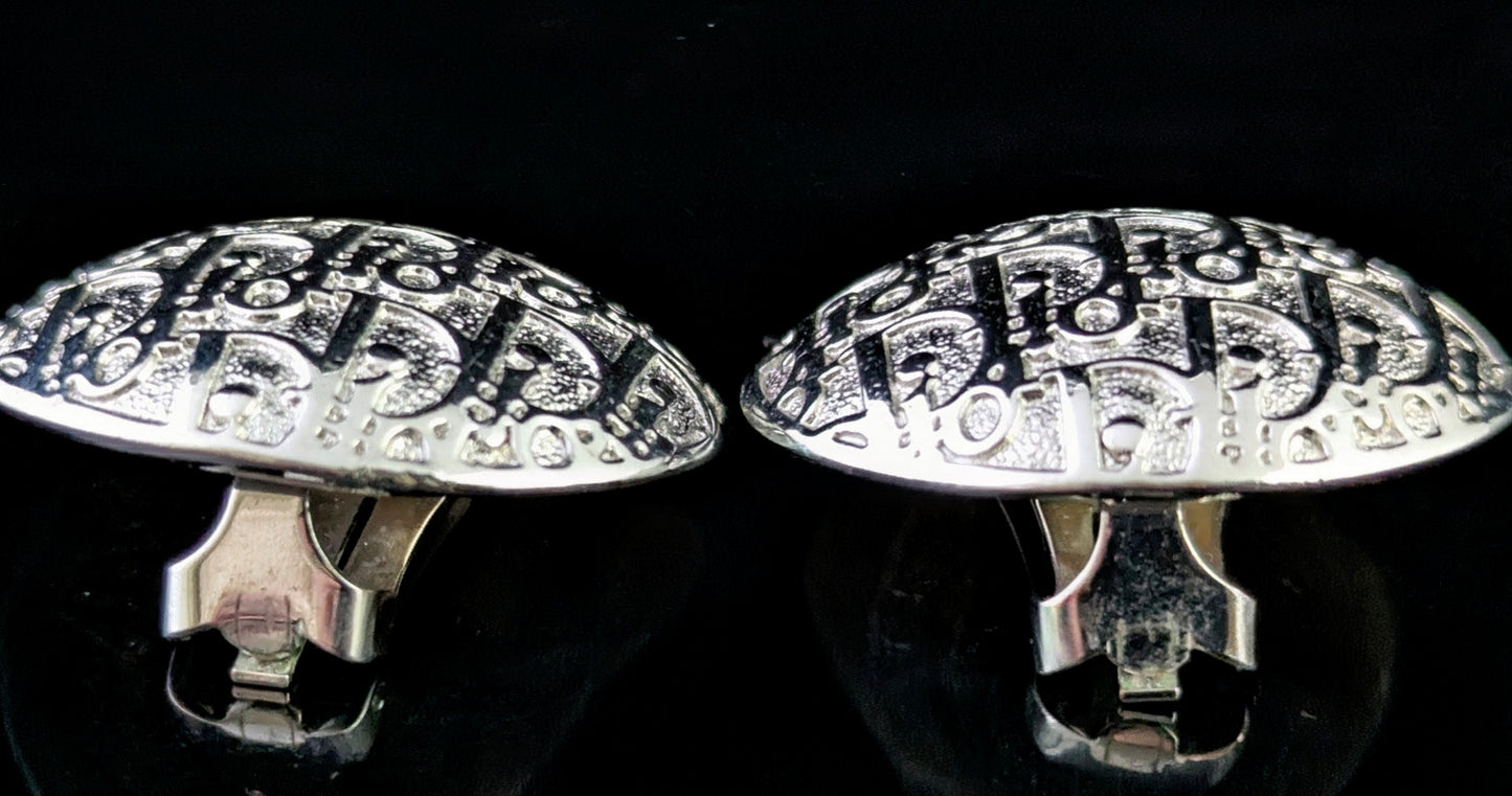Vintage Christian Dior clip on earrings, logo script, silver tone
