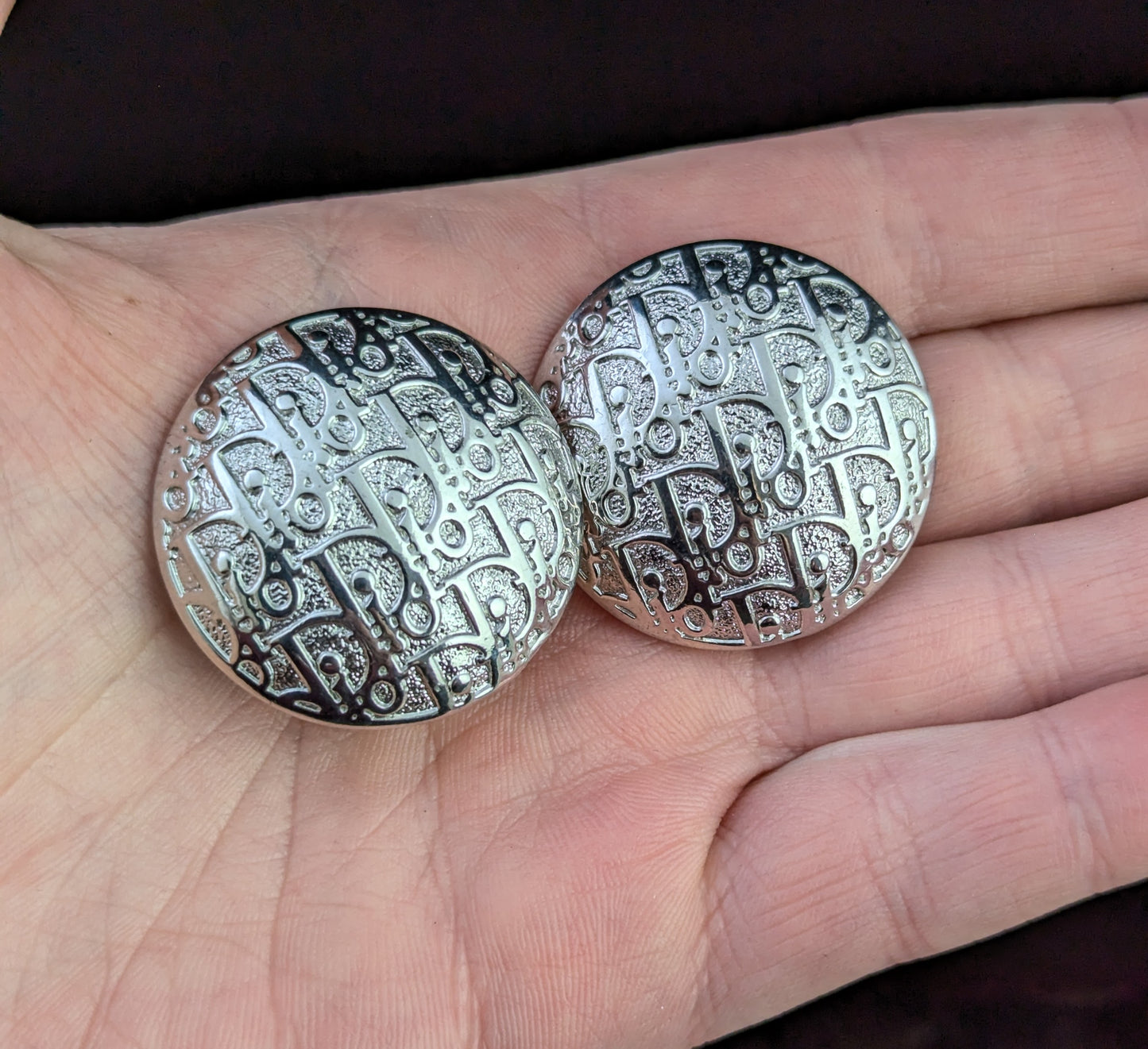 Vintage Christian Dior clip on earrings, logo script, silver tone