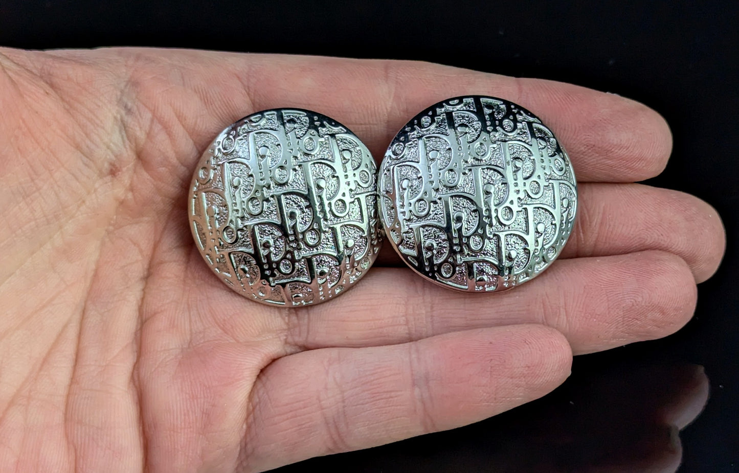 Vintage Christian Dior clip on earrings, logo script, silver tone