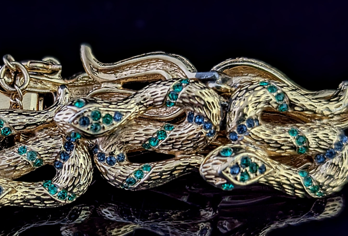 Vintage D'Orlan snake bracelet, gold plated, green crystal