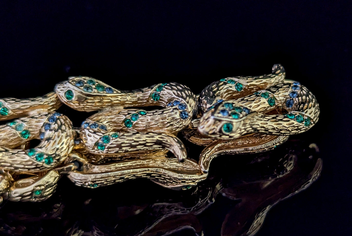 Vintage D'Orlan snake bracelet, gold plated, green crystal