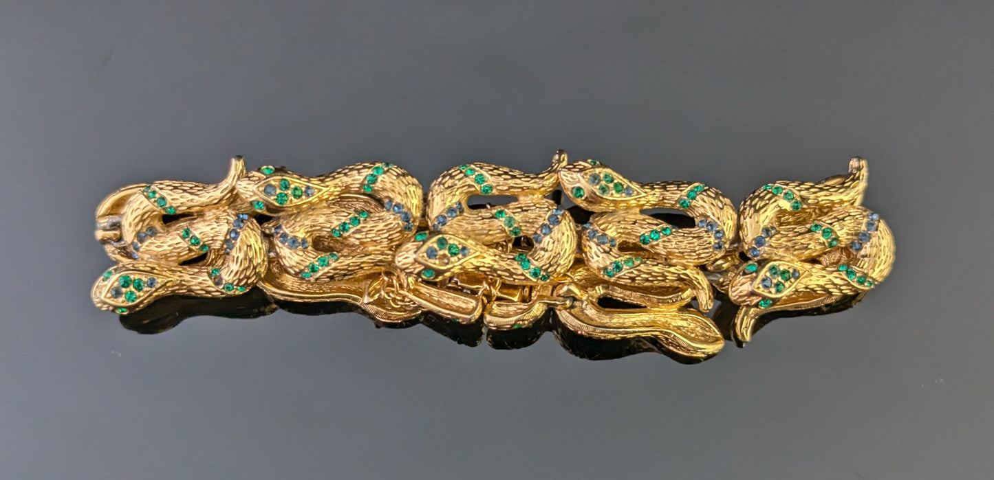 Vintage D'Orlan snake bracelet, gold plated, green crystal