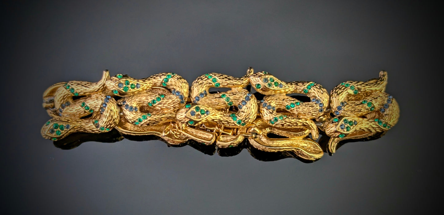 Vintage D'Orlan snake bracelet, gold plated, green crystal