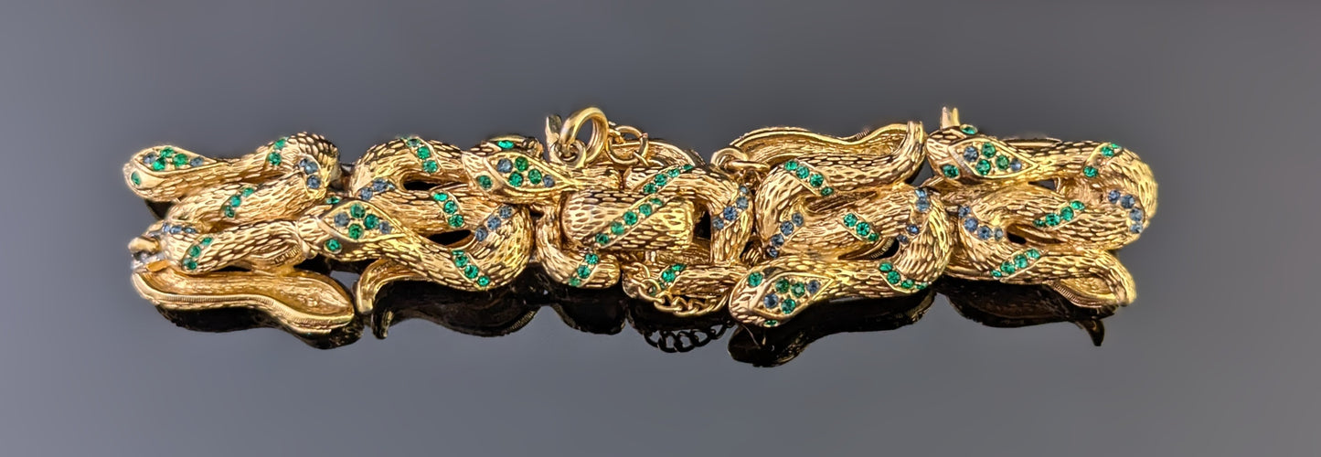 Vintage D'Orlan snake bracelet, gold plated, green crystal