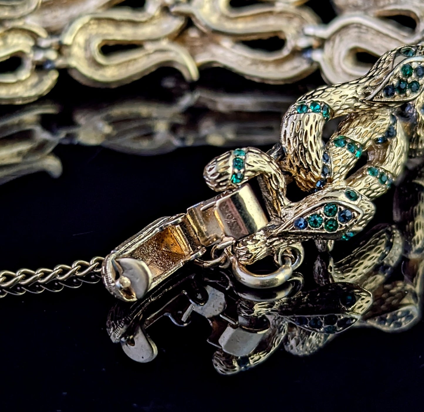 Vintage D'Orlan snake bracelet, gold plated, green crystal