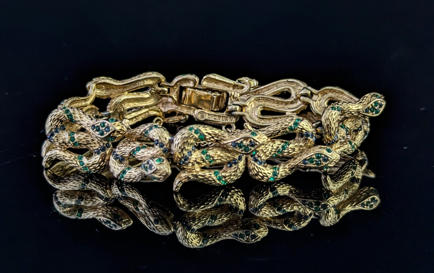 Vintage D'Orlan snake bracelet, gold plated, green crystal