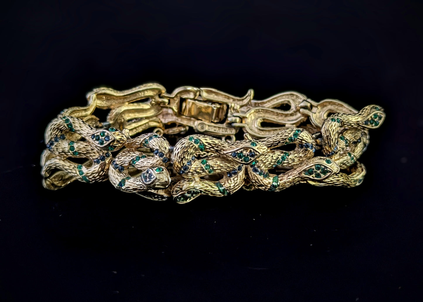 Vintage D'Orlan snake bracelet, gold plated, green crystal
