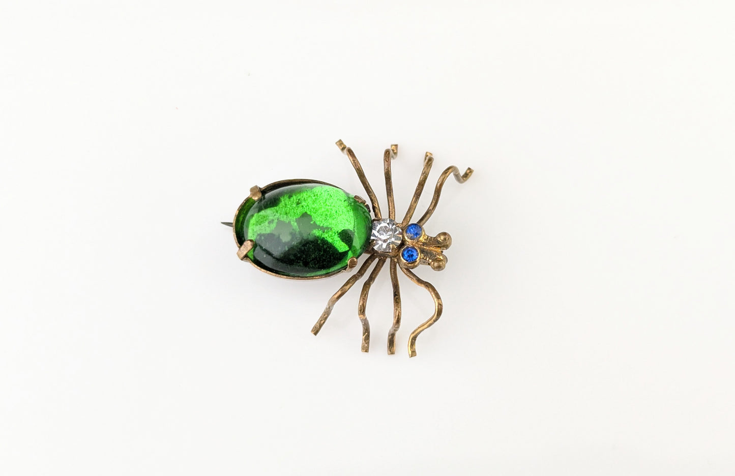 Antique emerald green paste spider brooch