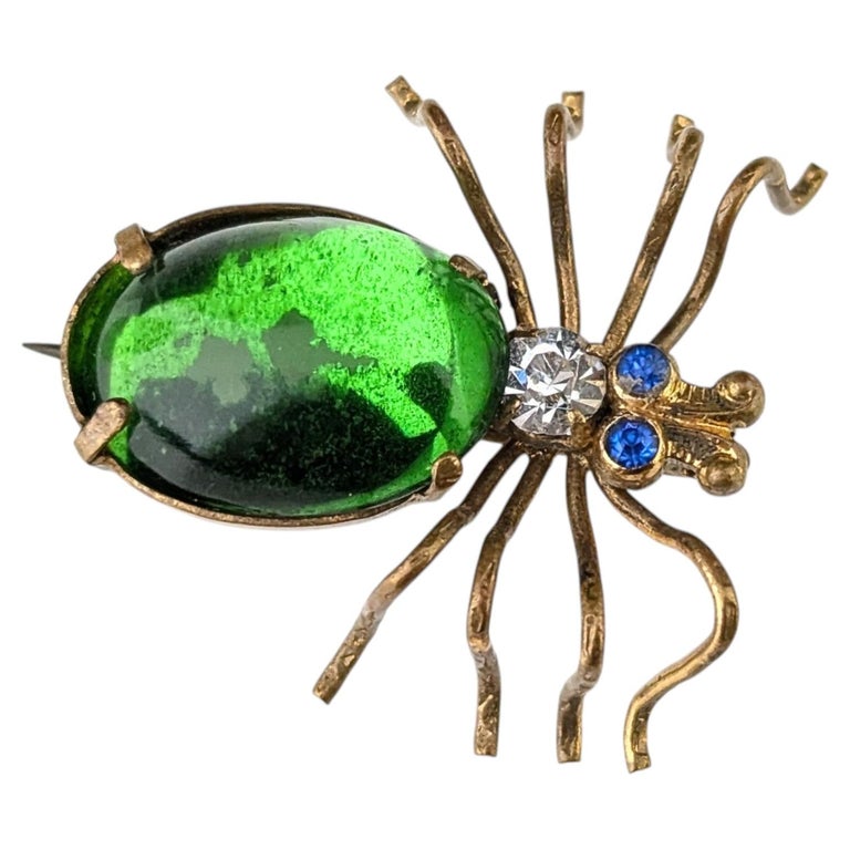 Antique emerald green paste spider brooch