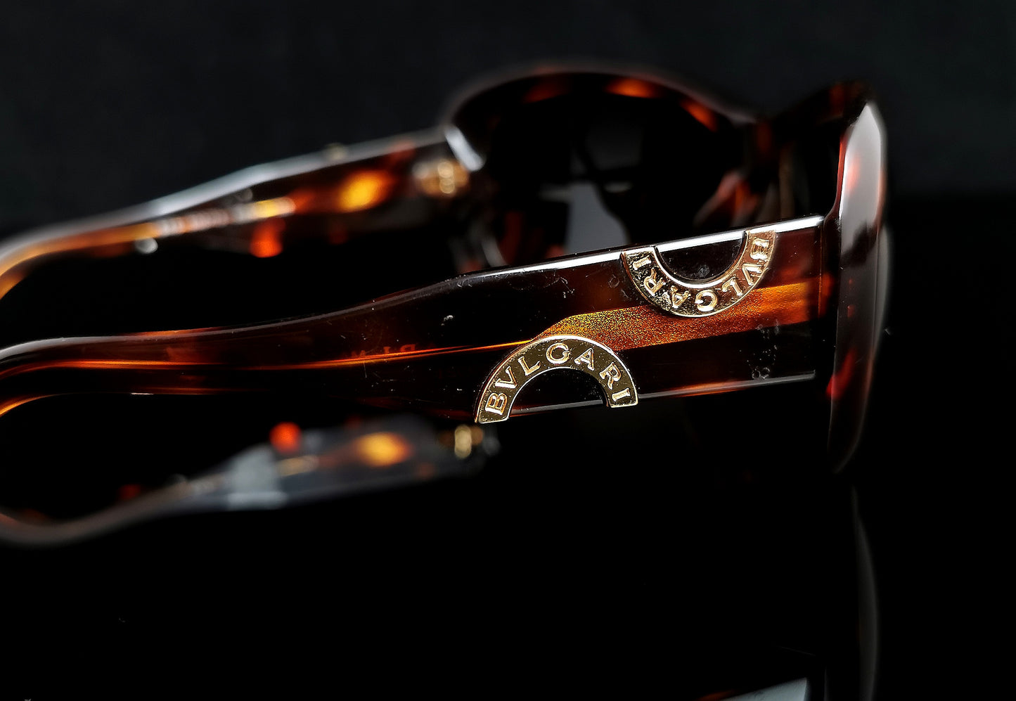 Bvlgari faux tortoiseshell sunglasses, gold tone logo
